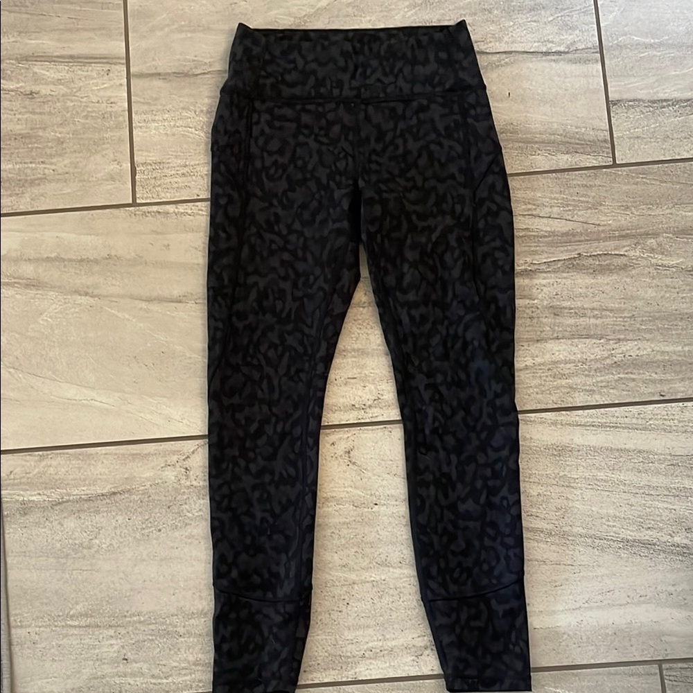 Lululemon Black Leopard Print In Movement Leggings 6